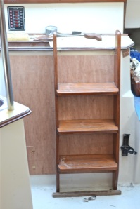 Three coats of varnish will darken the material and make it blend with the rest of the interior woodwork.
