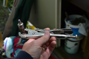This is the other half of the setting tool. It sets on top of the grommet collar and is driven through the material and grommet halves. The shape of the tool clamps the grommet halves together.