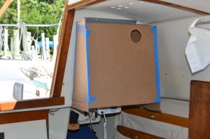 Design is complicated by the forward-sloping companionway bulkhead.