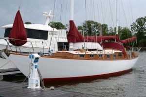 Beautiful classic-styled ketch with teak coach.  The varnish is stunning.