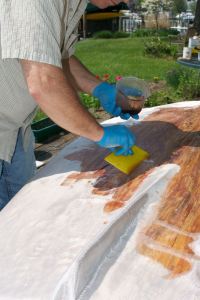 Squeegee moves the resin around efficiently on flat horizontal surfaces.